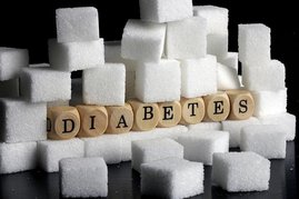 Symbolbild für die Erkrankung Diabetes Zuckerwürfel