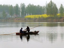Fischer am Shaying-Fluss in China Fischer am Shaying-Fluss in China