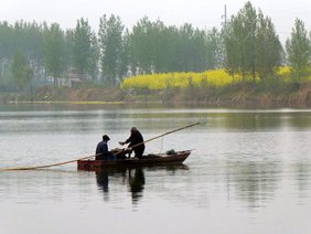 Fischer am Shaying-Fluss in China Fischer am Shaying-Fluss in China